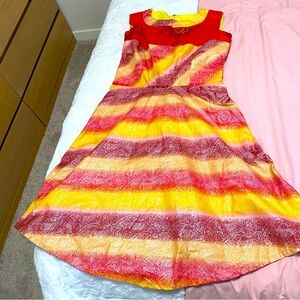 A multi color fun dress for kids and teens